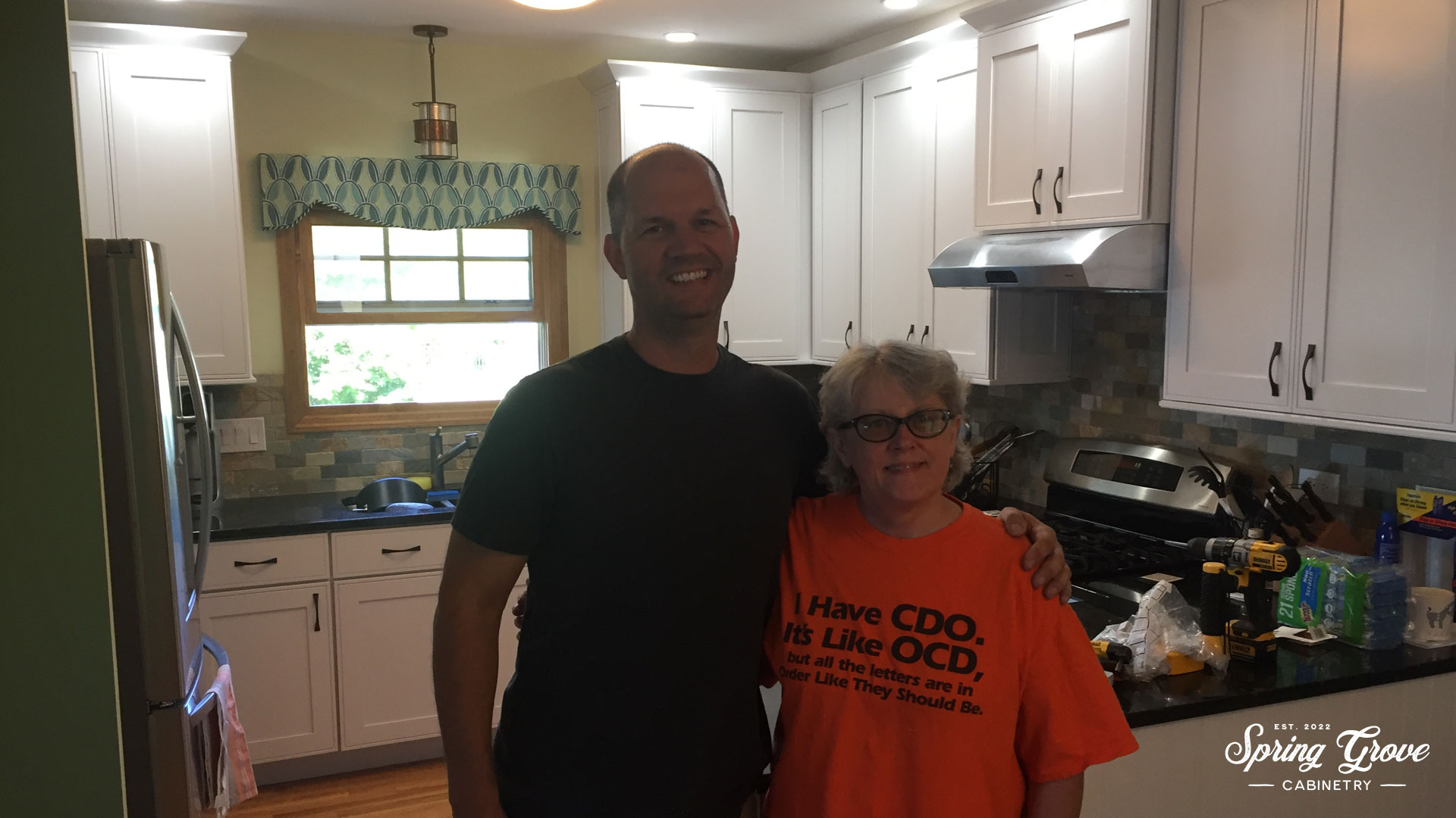 Laura and I in her finished kitchen.
