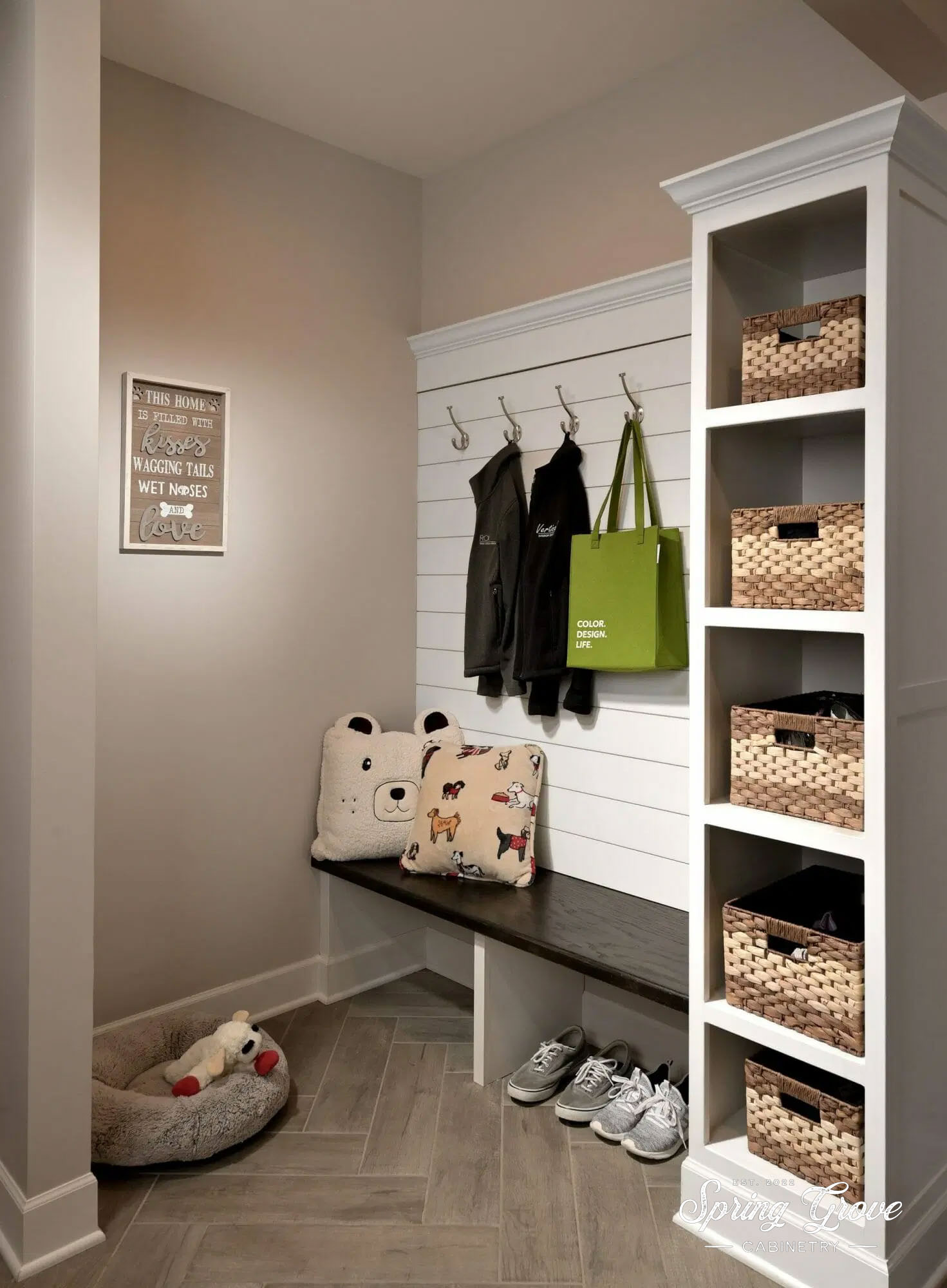 Mudroom bench with baskets. Custom made by Spring Grove Cabinetry.
