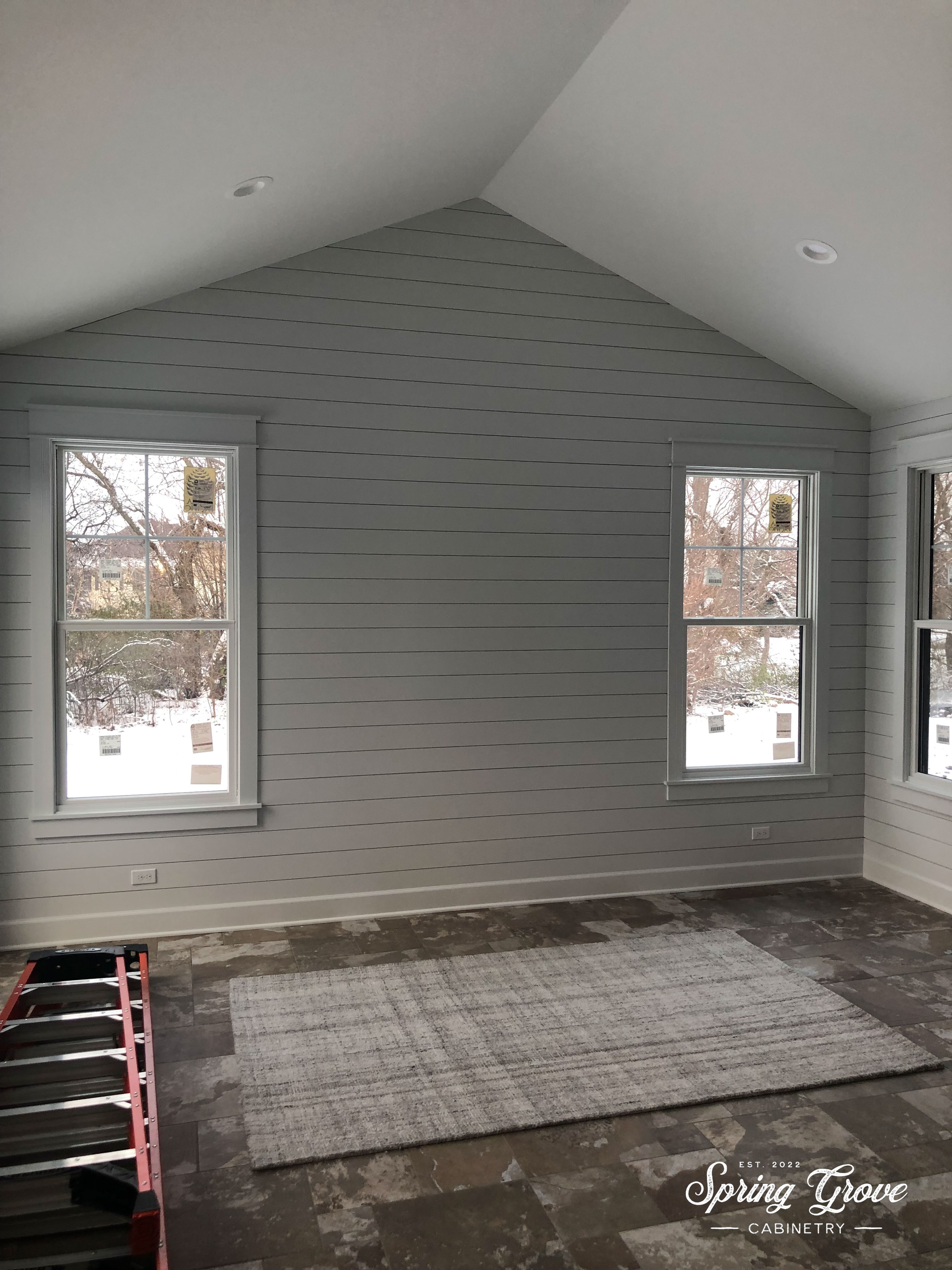 Sunroom after we installed the shiplap and window trim.