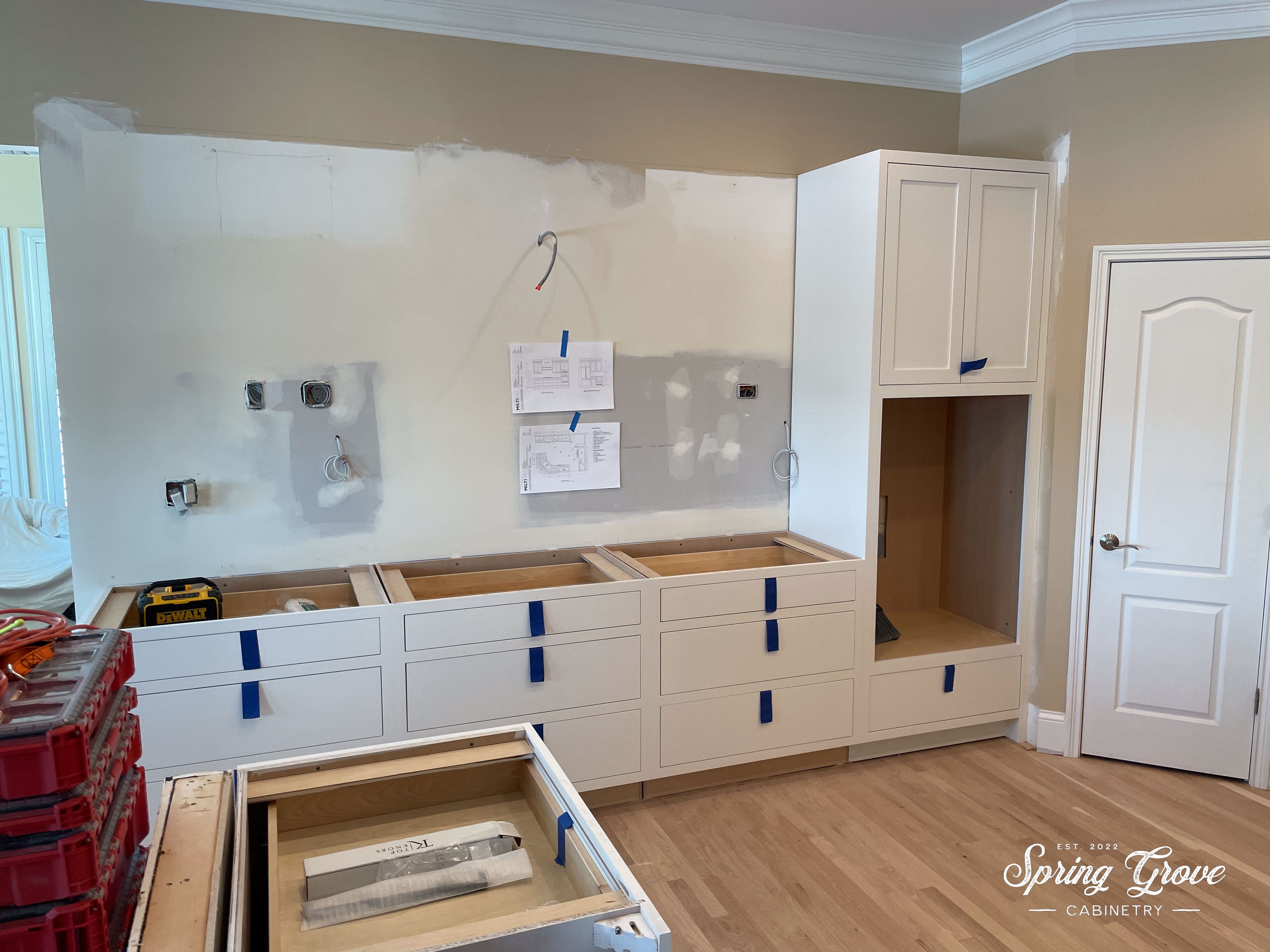 Base cabinets going in. We install these first, so that the countertops can be meaured asap.