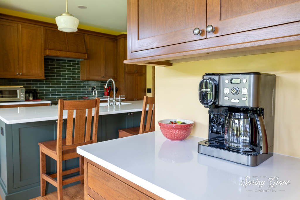 The coffee bar is located out of the way of the hustle and bustle of the kitchen for effortless access to all of your coffee needs.