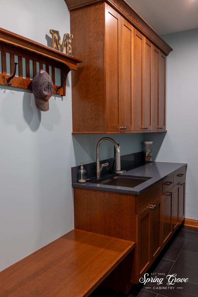 After a long day's work, come home and hang your hat up and kick off the shoe on the handcrafted bench. Then wash your hands off in the sink before heading into the rest of the house.
