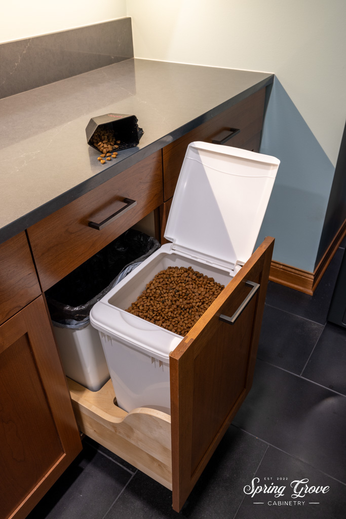 Hidden in the drawer is a container for dog food to be nicely tucked away for when guests over and keep any wandering noses from getting in.