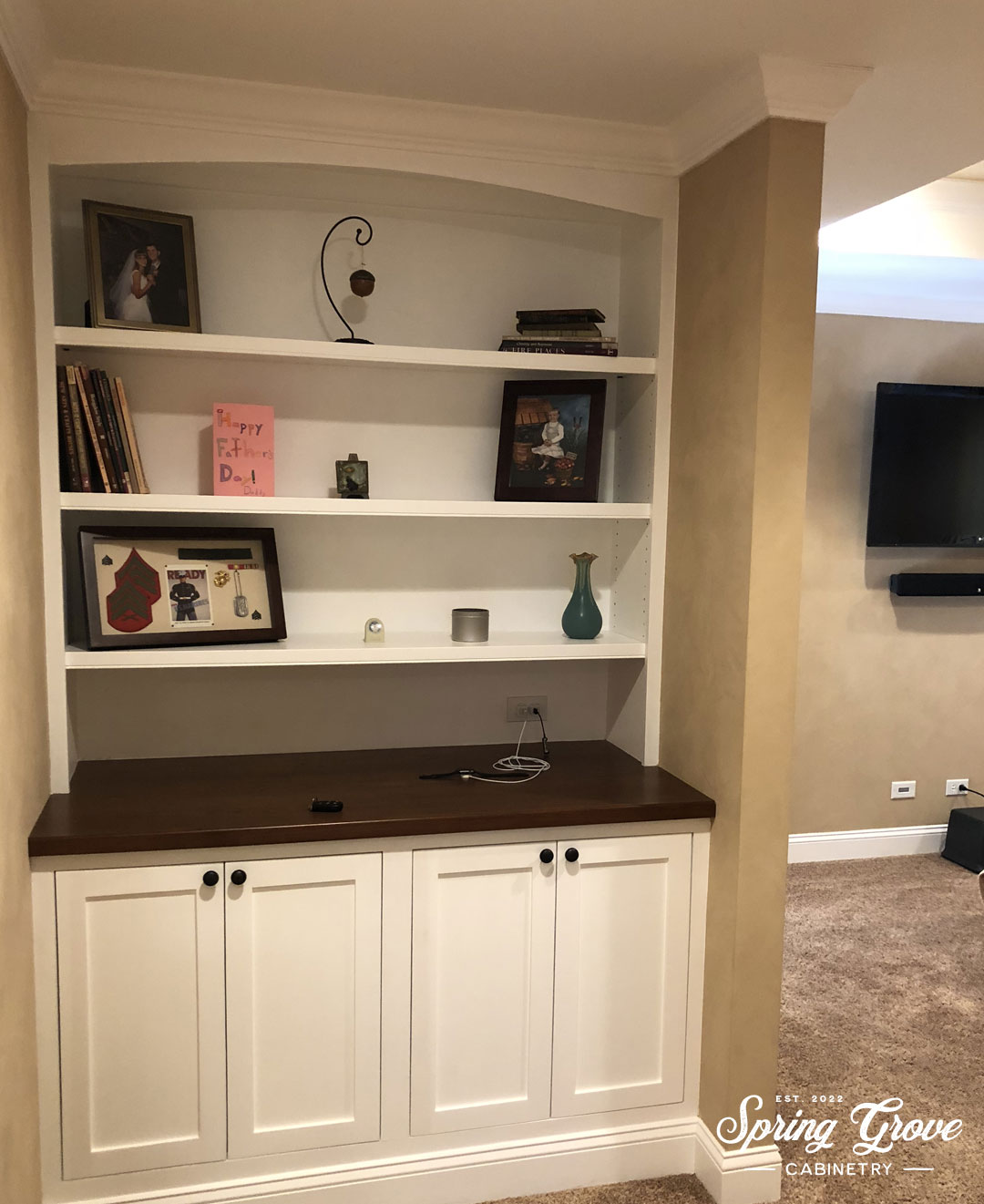 Built-in cabinets and shelves replaced the old closet.